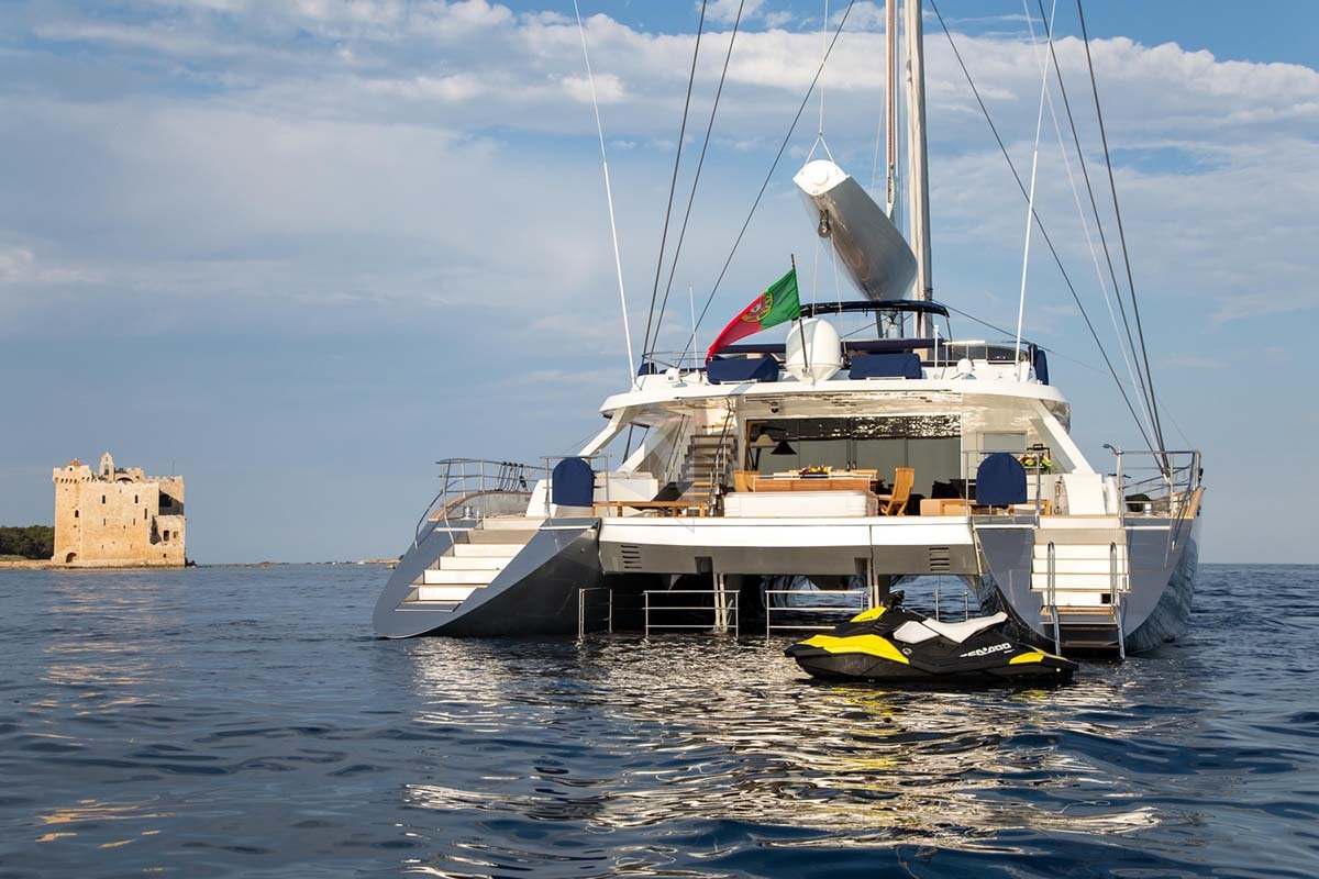 Hutiane Catamaran At Anchor Aft